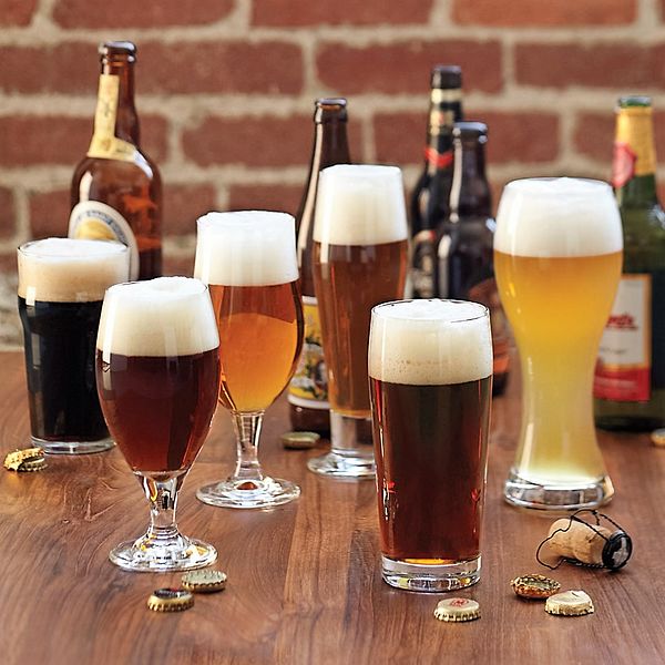 Various beer types in different glasses and bottles