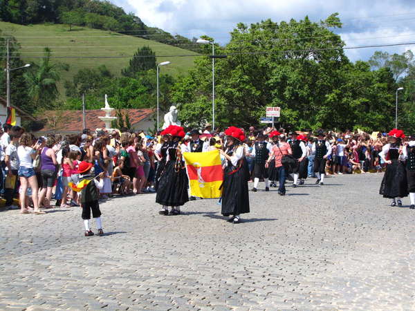 Women in traditional Bollenhut costumes from the German Black Forest at a parade in Santa Catarina, Brazil in 2010. 