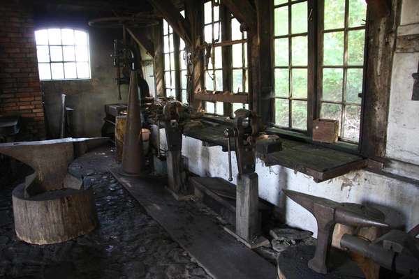 interior of Smithy, Kiekeberg open air museum interior of a smithy with anvils and work bench