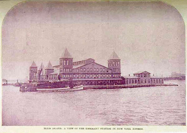 Photograph of Ellis Island at the port of New York, taken about 1896. Smaller boats have moored. 