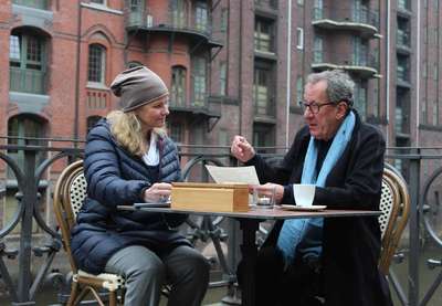 Andrea Bentscheider and Geoffrey Rush during the filming of "Who Do You Think You Are?" in the Speicherstadt Hamburg