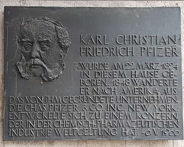 Memorial plaque with a picture of Karl Pfizer and an inscription in German saying "Karl Christian Friedrich Pfizer was born in this house on 22 March 1824. In 1848 he emigrated to America. The company he founded, Chas. Pfizer & Co., Inc., New York, developed into a concern of world renown in the chemical-pharmaceutical industry. - 6 May 1966."